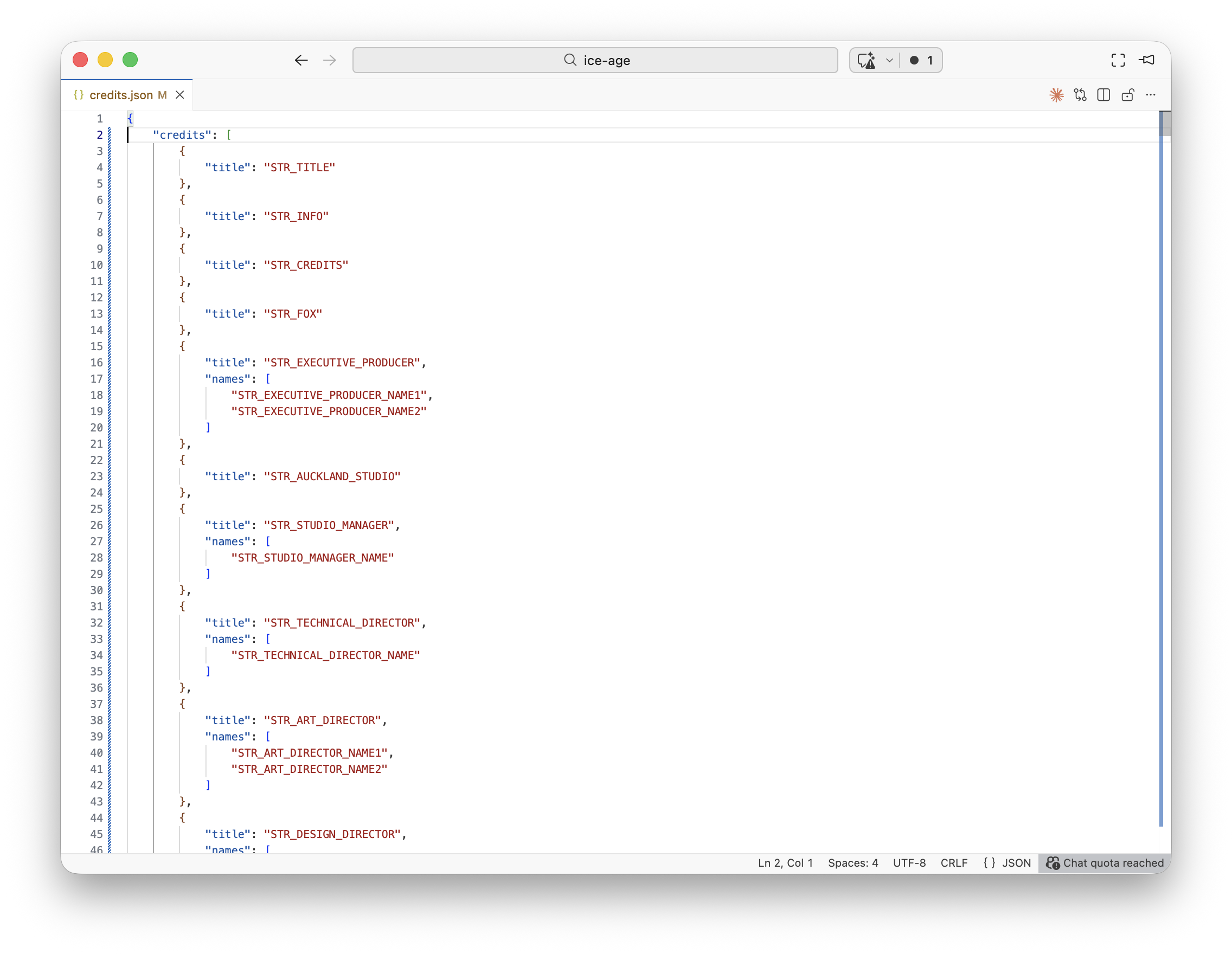 credits.json showing the JSON structure with STR_ localization keys for roles and names